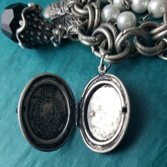 2/25$ Silver tone bracelet with charms and locket - Picture 2 of 5